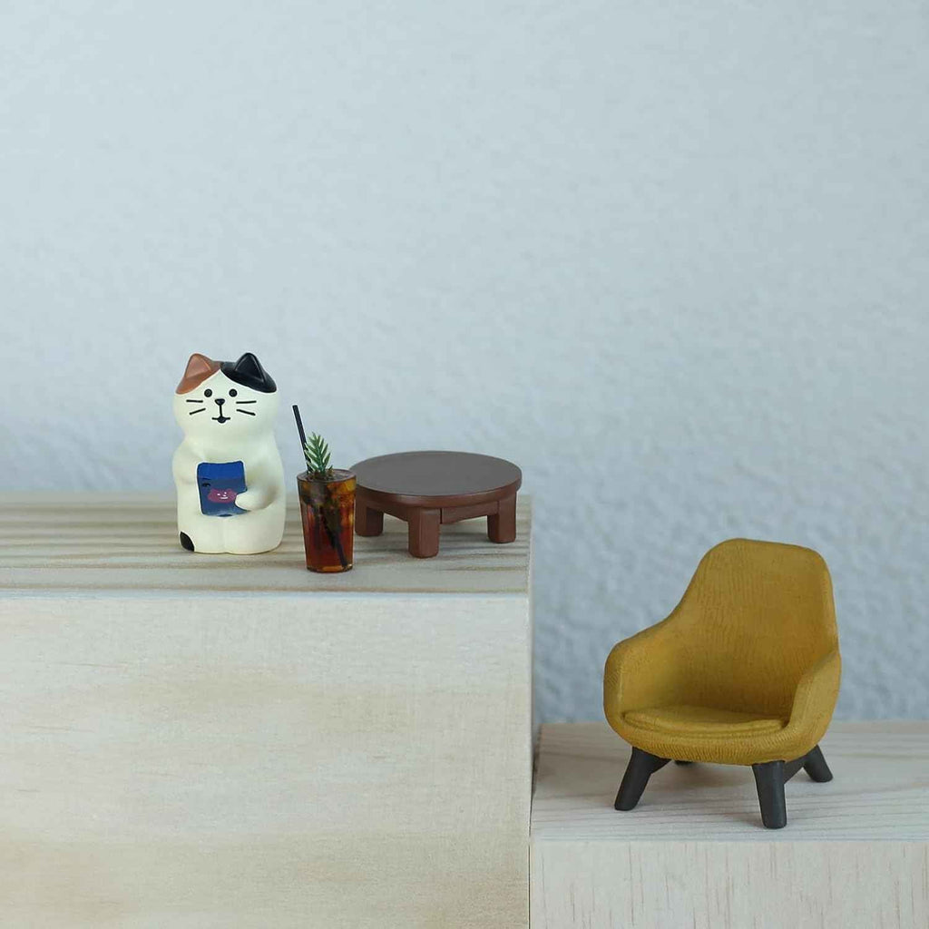 Cute cat figurine playing phone on sofa with coffee, cat lovers gift for home decor