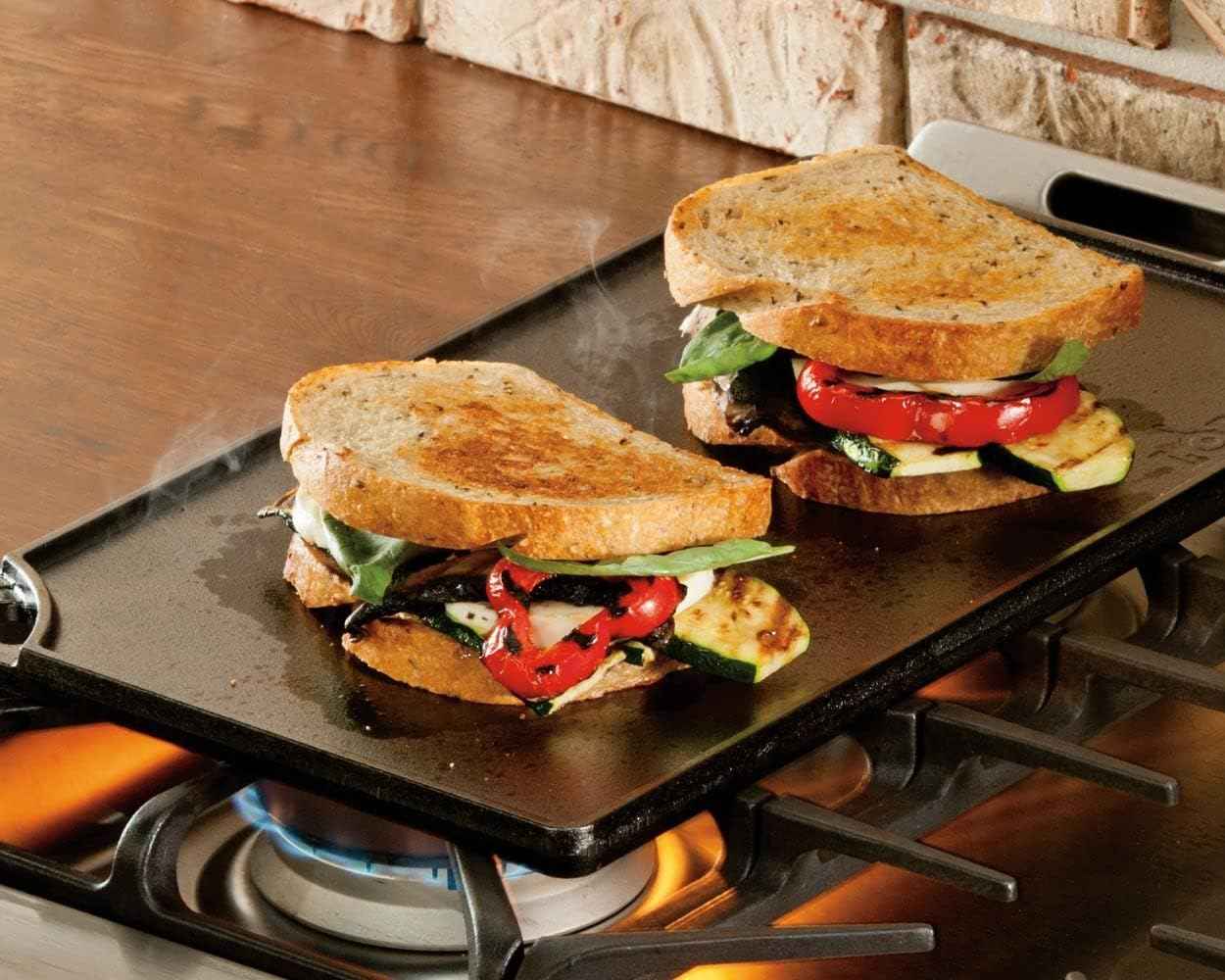 Lodge Reversible Cast Iron Grill/Griddle, 9.5 x 16.75 Inch Pre-Seasoned, Stove, Grill, or Campfire Use, Heavy-Duty, Black, Made in USA
